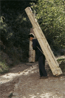 Carrying building materials for pagoda in mountains of Gansu China